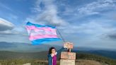 Woman embarks on 'incredible' journey to hike a trans pride flag up 115 mountains: 'I'm deeply moved'