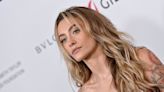 Paris Jackson Dazzles in Cutout Gown While Posing With Pooch
