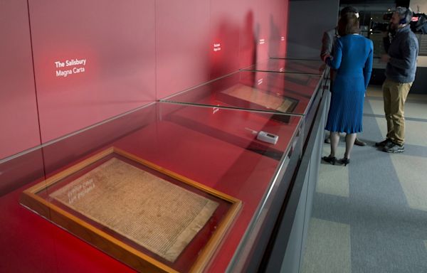 Environmentalists attack a case holding a copy of the Magna Carta in London but document unscathed