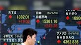 Asian shares tread cautiously; Wall St unfazed as Joe Biden bows out