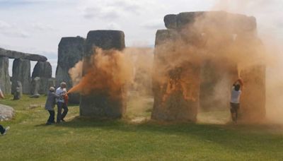 Two Just Stop Oil protesters arrested after spraying Stonehenge orange