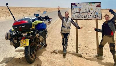 They set off around the world on a motorcycle and ‘fell off many times.’ Now they’re in the record books