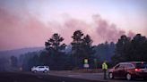 New Mexico governor declares emergency as thousands flee wildfires that have damaged 500 structures