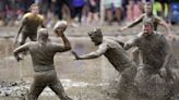 Joy in Mud Bowl: Football tournament celebrates 50 years of messy fun