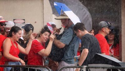 Panthers fans get drenched as they await Stanley Cup beach celebration. See the scenes