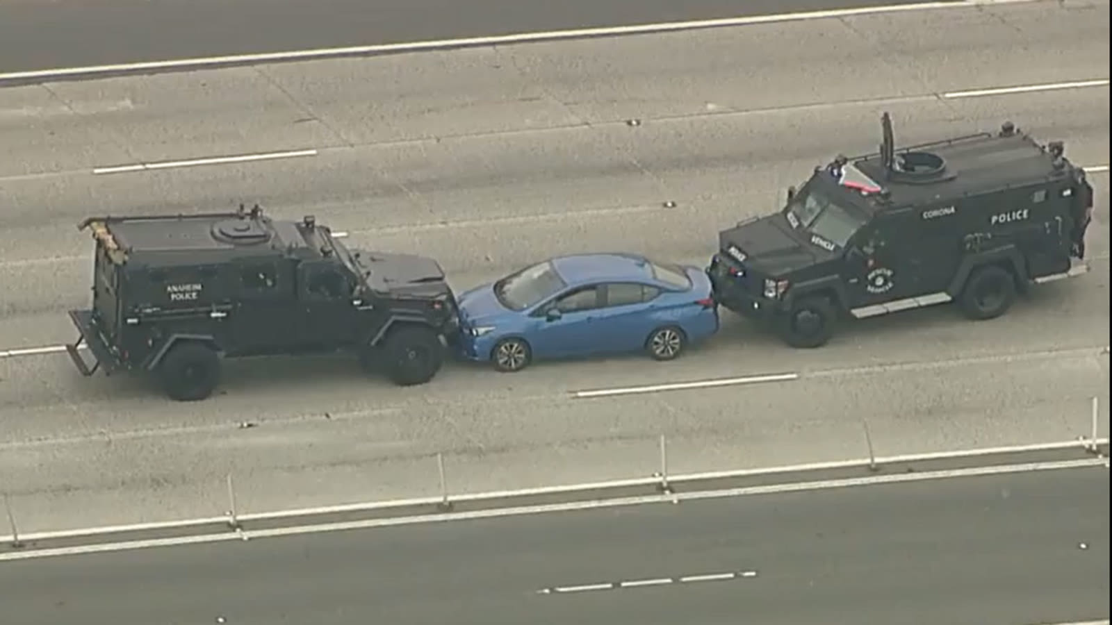 Major highway closed in Anaheim amid standoff involving police SWAT team, suspect: WATCH LIVE