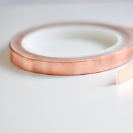 Thin copper tape used to wrap around the edges of stained glass pieces before soldering. Helps create a smooth and even solder line. Available in different widths and thicknesses.