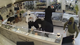 Jewelry store clerk opens fire on smash-and-grab thieves