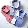 Similar to a button-down dress shirt, but with a spread collar that lays flat. Can be worn with or without a tie. Often made of cotton or a cotton blend.