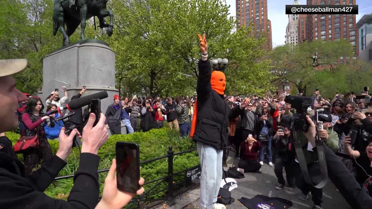 Video: Crowd cheers as man eats 700 cheese balls in under 30 minutes