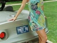 FILE PHOTO: Newly named Playboy Playmate of the Year Karen McDougal poses with her new Shelby series Mustang whi..