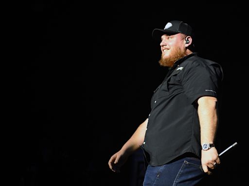 Luke Combs made his best friends sing in front of a sellout crowd as a nerve-racking fantasy football punishment