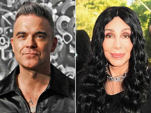 Robbie Williams Was Accidentally 'Rude' to Cher in an Airport by Walking Away Before She 'Finished Talking'