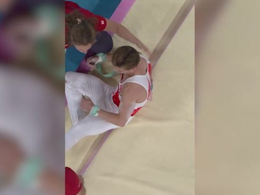 Gymnast goes flying in shock fall after equipment breaks