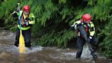 Photos: Missing girls found unharmed in surging Webster Groves creek