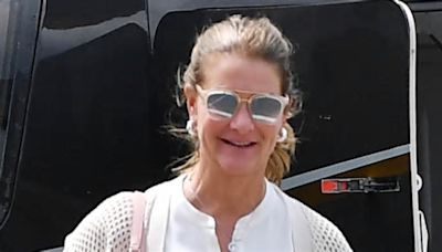 Bill Gates' billionaire ex wife Melinda flashes a HUGE new diamond ring on engagement finger after private helicopter ride… as she finds happiness following split from the ...