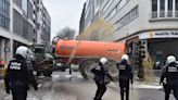 Farmers spray liquid manure on police as clashes break out in Brussels