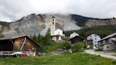 Photos show the picturesque Swiss village that had to evacuate because 70 million cubic feet of rock could come spilling down the mountainside