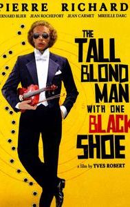 The Tall Blond Man With One Black Shoe