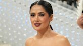 Salma Hayek Lounges on a Boat in a Blue Bikini