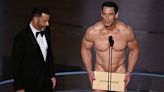 John Cena gives out costume design Oscar in his ‘birthday suit’