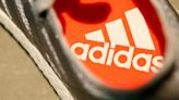 Adidas slashes 2022 outlook, investors pin hopes on incoming CEO