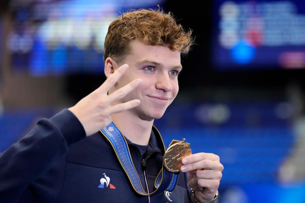 With plenty of swimming stars at the 2024 Olympics, France’s Marchand may shine brightest