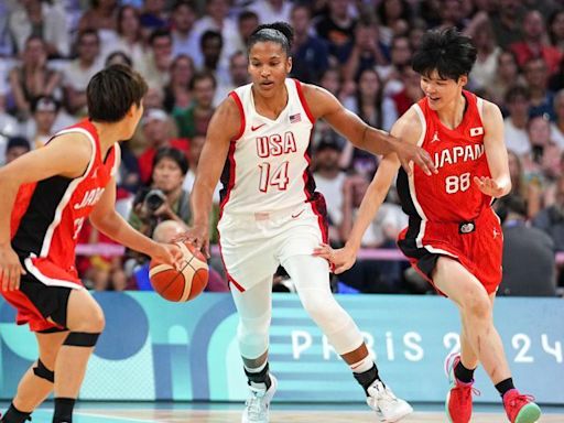 US women's basketball team begins title defence with win over Japan