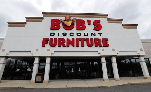 Bob’s Discount Furniture really, really wants you to know it’s not closing - The Boston Globe