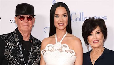 Katy Perry Supported by Her Parents on the Red Carpet as She Dazzles in the Perfect White Dress