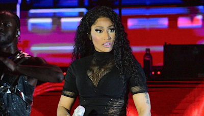 Watch: Nicki Minaj Reacts After Fan Throws Item At Her During Concert | iHeart