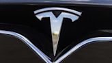 The Zacks Analyst Blog Highlights Tesla, TotalEnergies, Intuitive Surgical, Charles Schwab and Monster Beverage