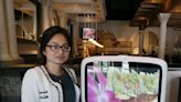 Japanese restaurant at Summit Mall employs robot host, servers to combat labor shortage