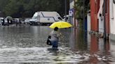 Man swept away in floodwater as heavy rainstorms batter parts of northern Italy