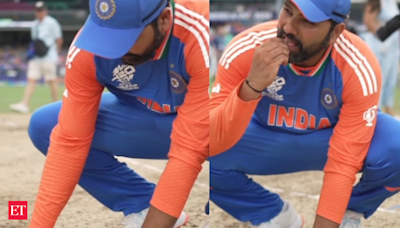 WATCH: Rohit Sharma says goodbye with special gesture; eats soil of Barbados pitch - The Economic Times