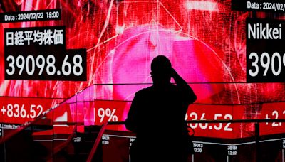 Asia shares hit 15-month high as traders wait for CPI