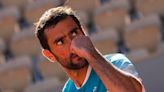 Marin Cilic fights through as Iga Swiatek marches on – day 11 at the French Open