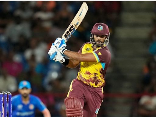 T20 World Cup 2024: Azmatullah Omarzai Concedes 36 Runs in an Over; Nicholas Pooran Smashes 26 - News18