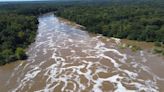 Floodwaters drain in Mississippi as Pearl River crests just below major flood stage; National Guard to distribute water