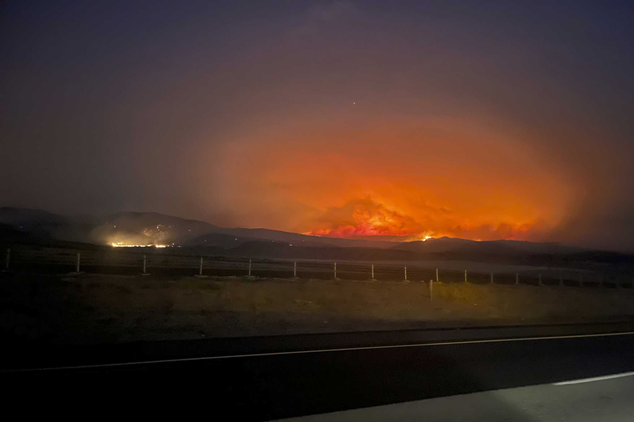 Oregon fire is the largest burning in the US. Officials warn an impending storm could exacerbate it