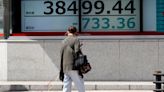 Stock market today: Asian shares track Wall Street slump triggered by strong US spending data