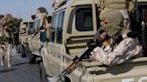 Clashes break out in Tripoli, drive rival Libyan PM away