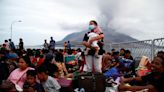 Indonesia volcano eruptions force thousands to evacuate as airlines cancel flights