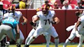 Commanders Wes Schweitzer works on the field and the rocks