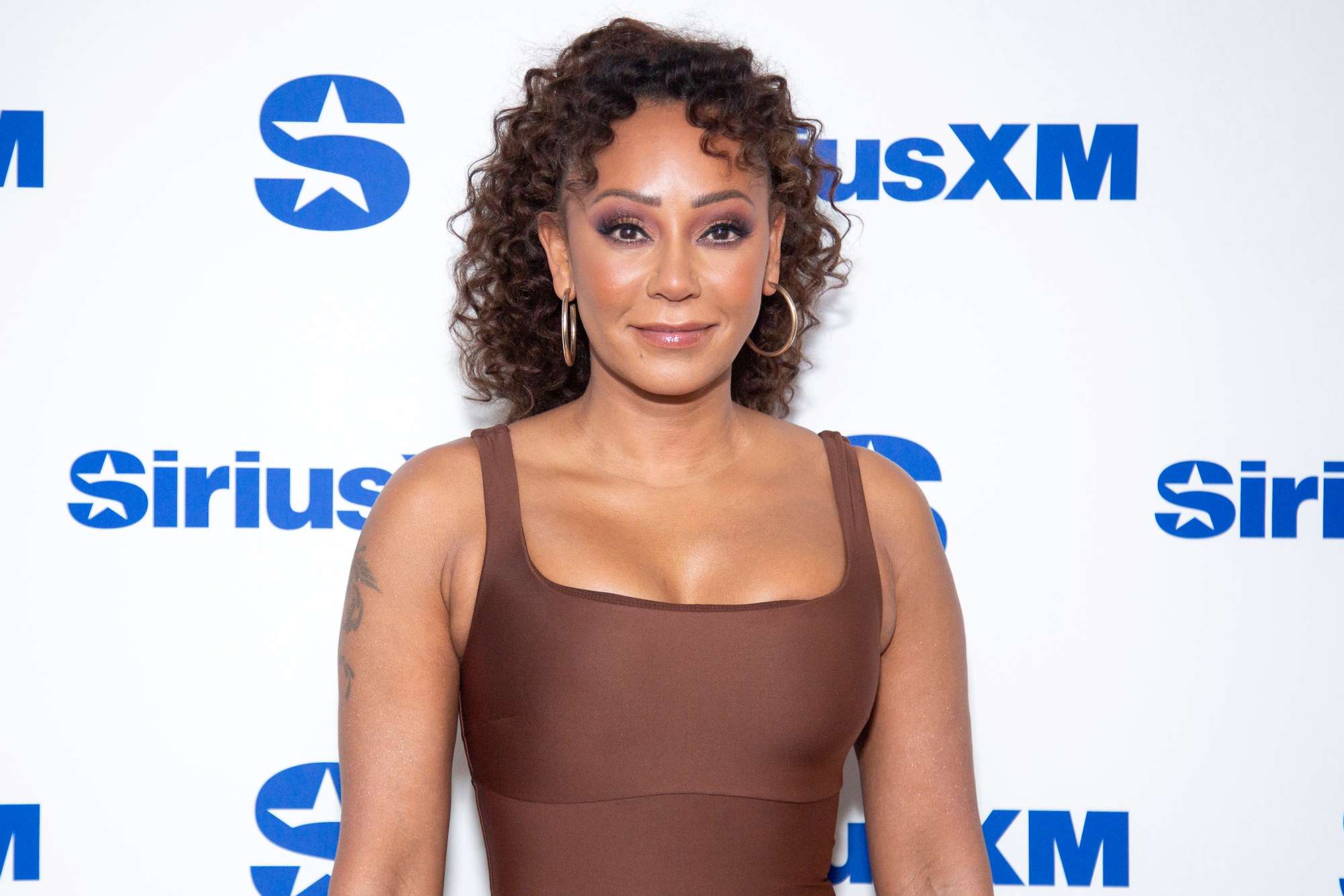 Mel B Accepts Honorary Doctorate in a Custom Leopard-Print Graduation Gown Inspired by Scary Spice