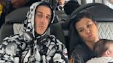 Kourtney Kardashian cradles baby Rocky in snap with Travis Barker