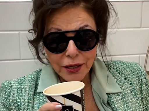 Joan Collins enjoys break from shopping as she sips on latte at Marks and Spencer café