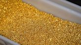 Gold hovers near over one-month peak as Fed cut rate hopes lend support