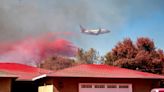 Northern California wildfire does not grow, but winds and hot weather could whip up flames