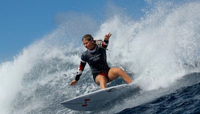 Canadian Olympic surfer Sanoa Dempfle-Olin riding a wave into Paris Games